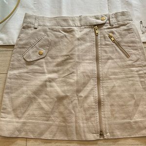 Zipper khaki skirt with gold zippers and buttons